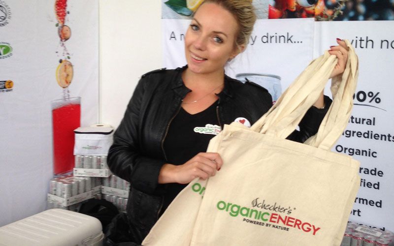 Girl showing a personalised tote bag