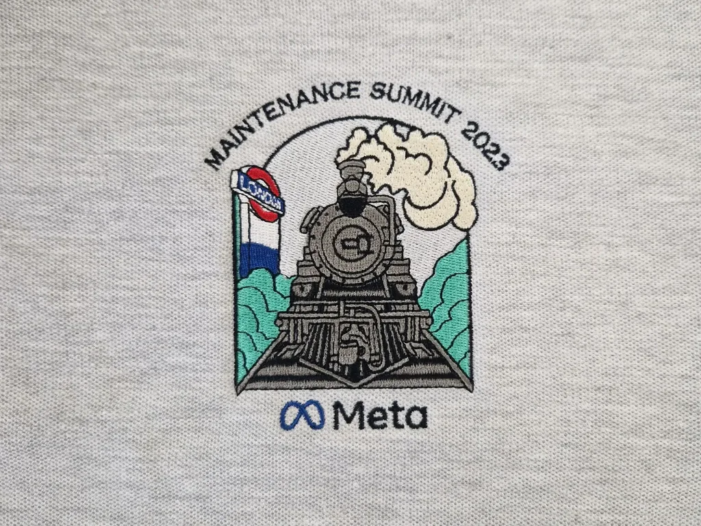 Embroidered polo shirt for a Meta maintenance summit, by Garment Printing