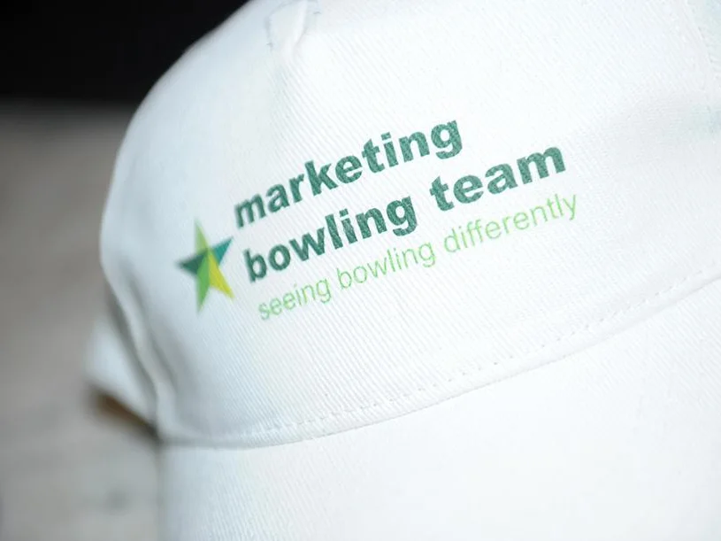 Printed caps for Partnership's corporate event