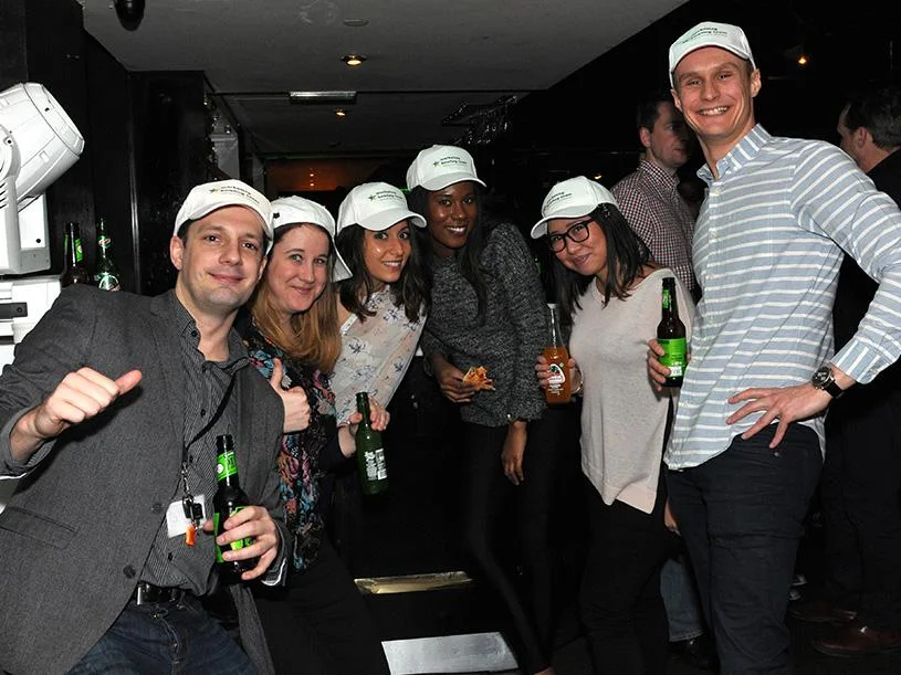 Partnership team wearing the personalised caps