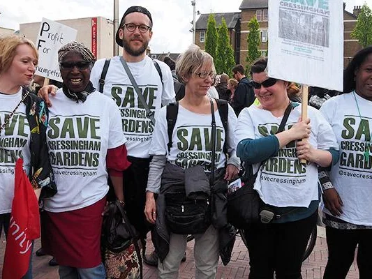 Campaigners in printed T-shirts at the Brixton event